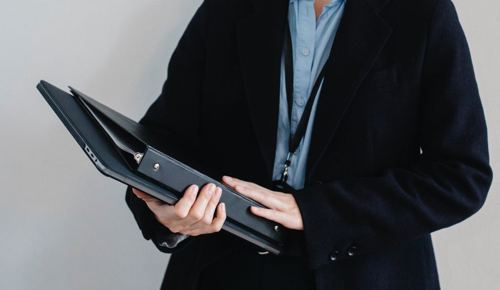 A man with a folder